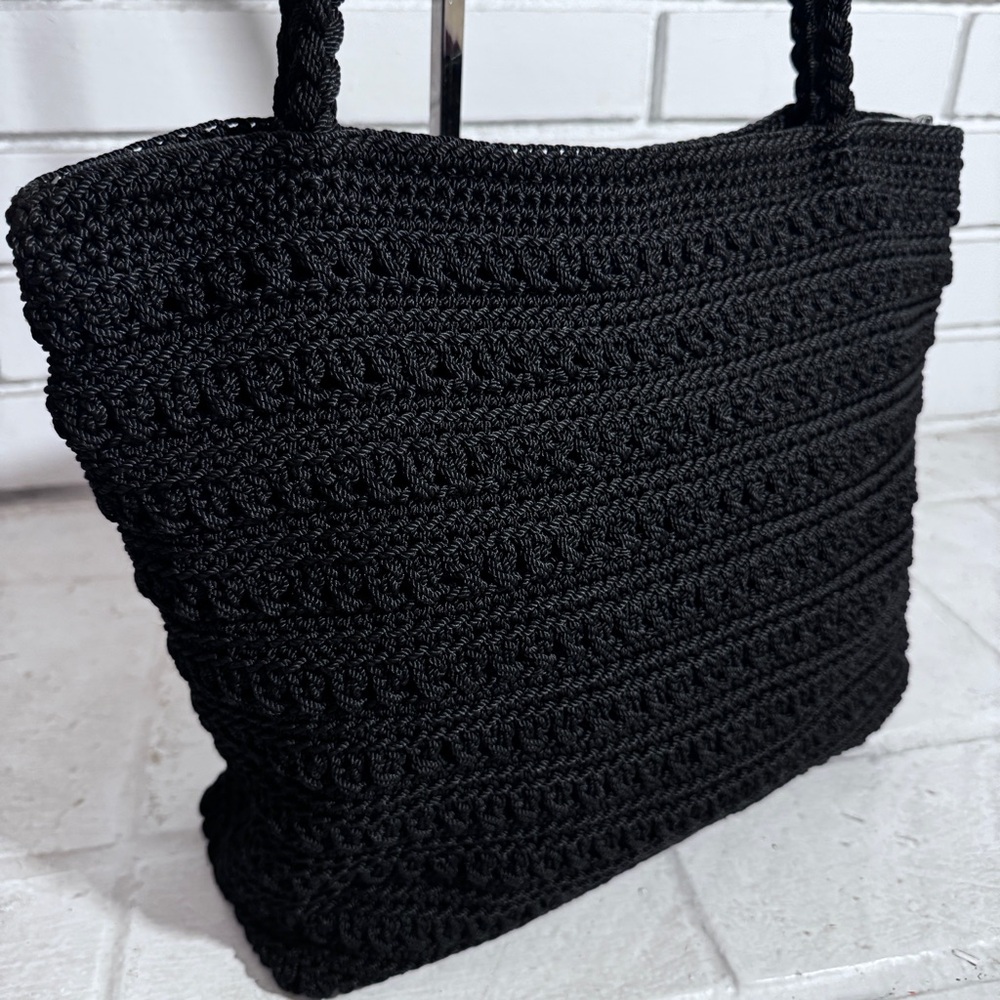 Crocheted/knit black purse in like new condition